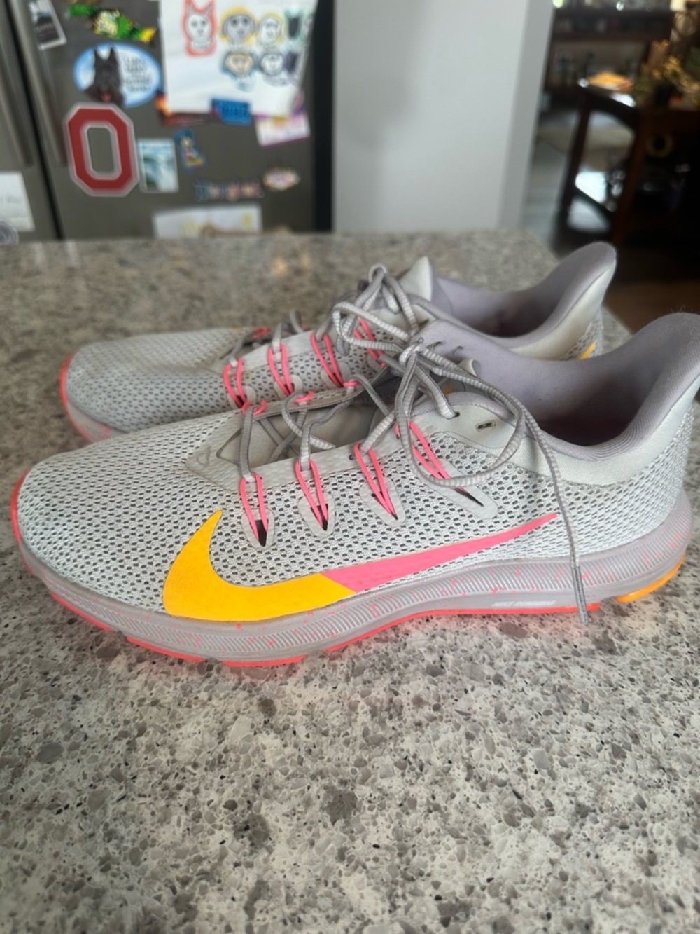 Nike Women's Light Gray Running Sneakers with Yellow & Pink Swoosh